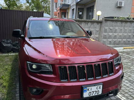 Червоний Джип Grand Cherokee, об'ємом двигуна 5.65 л та пробігом 170 тис. км за 23000 $, фото 1 на Automoto.ua