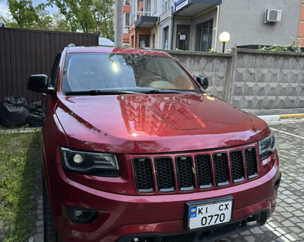 Красный Джип Гранд Чероки, объемом двигателя 5.65 л и пробегом 170 тыс. км за 22500 $, фото 1 на Automoto.ua