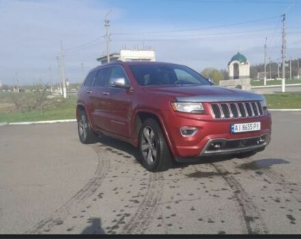 Червоний Джип Grand Cherokee, об'ємом двигуна 3 л та пробігом 110 тис. км за 21000 $, фото 1 на Automoto.ua