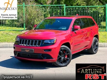 Красный Джип Гранд Чероки, объемом двигателя 5.7 л и пробегом 143 тыс. км за 27300 $, фото 1 на Automoto.ua