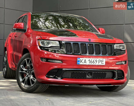 Червоний Джип Grand Cherokee, об'ємом двигуна 6.42 л та пробігом 177 тис. км за 35999 $, фото 1 на Automoto.ua