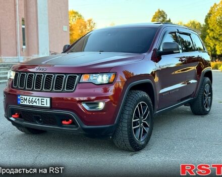 Червоний Джип Grand Cherokee, об'ємом двигуна 5.7 л та пробігом 99 тис. км за 35000 $, фото 1 на Automoto.ua