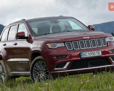 Червоний Джип Grand Cherokee, об'ємом двигуна 5.65 л та пробігом 58 тис. км за 42000 $, фото 1 на Automoto.ua