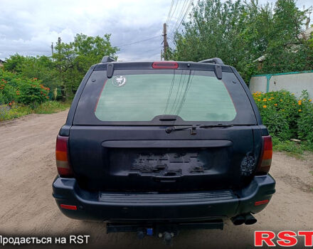 Джип Гранд Чероки, объемом двигателя 2.7 л и пробегом 260 тыс. км за 9500 $, фото 5 на Automoto.ua