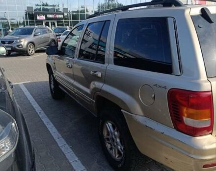 Жовтий Джип Grand Cherokee, об'ємом двигуна 3.12 л та пробігом 334 тис. км за 6500 $, фото 2 на Automoto.ua