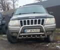 Сірий Джип Grand Cherokee, об'ємом двигуна 0.27 л та пробігом 245 тис. км за 7500 $, фото 4 на Automoto.ua