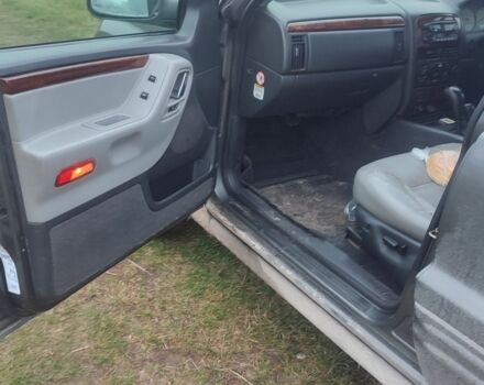 Серый Джип Гранд Чероки, объемом двигателя 2.7 л и пробегом 300 тыс. км за 3574 $, фото 3 на Automoto.ua