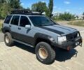 Сірий Джип Grand Cherokee, об'ємом двигуна 5.2 л та пробігом 200 тис. км за 12999 $, фото 1 на Automoto.ua