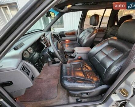 Серый Джип Гранд Чероки, объемом двигателя 5.2 л и пробегом 93 тыс. км за 6600 $, фото 5 на Automoto.ua