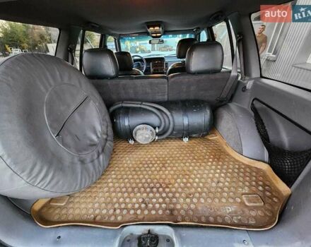 Серый Джип Гранд Чероки, объемом двигателя 5.2 л и пробегом 93 тыс. км за 6600 $, фото 10 на Automoto.ua