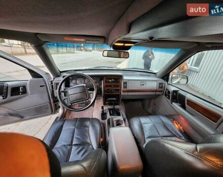 Серый Джип Гранд Чероки, объемом двигателя 5.2 л и пробегом 93 тыс. км за 6600 $, фото 7 на Automoto.ua