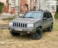 Сірий Джип Grand Cherokee, об'ємом двигуна 5.2 л та пробігом 370 тис. км за 5600 $, фото 1 на Automoto.ua