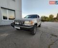 Сірий Джип Grand Cherokee, об'ємом двигуна 5.2 л та пробігом 93 тис. км за 6600 $, фото 1 на Automoto.ua