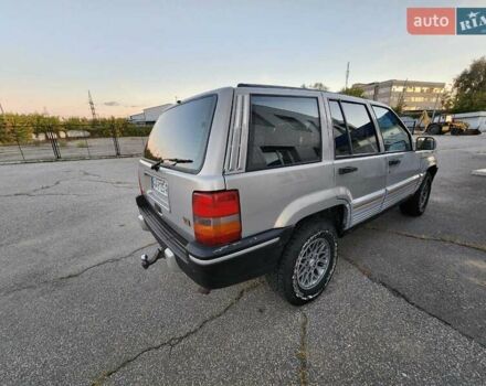 Серый Джип Гранд Чероки, объемом двигателя 5.2 л и пробегом 93 тыс. км за 6600 $, фото 2 на Automoto.ua