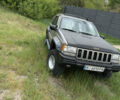Сірий Джип Grand Cherokee, об'ємом двигуна 2.5 л та пробігом 623 тис. км за 7800 $, фото 1 на Automoto.ua