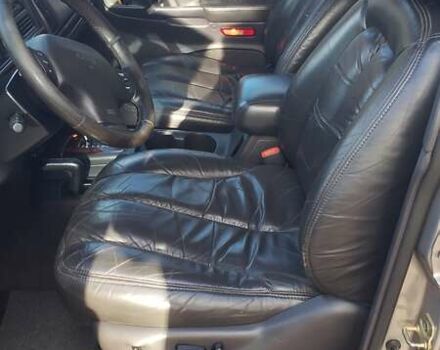 Сірий Джип Grand Cherokee, об'ємом двигуна 5.9 л та пробігом 216 тис. км за 10000 $, фото 14 на Automoto.ua