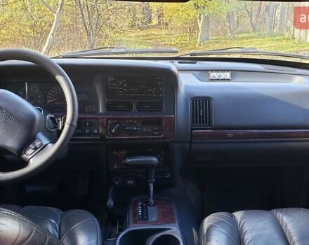 Сірий Джип Grand Cherokee, об'ємом двигуна 5.9 л та пробігом 216 тис. км за 10000 $, фото 16 на Automoto.ua