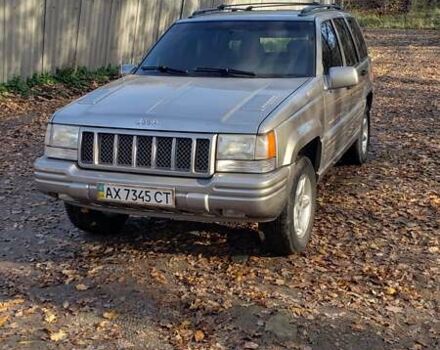 Сірий Джип Grand Cherokee, об'ємом двигуна 5.9 л та пробігом 216 тис. км за 10000 $, фото 5 на Automoto.ua