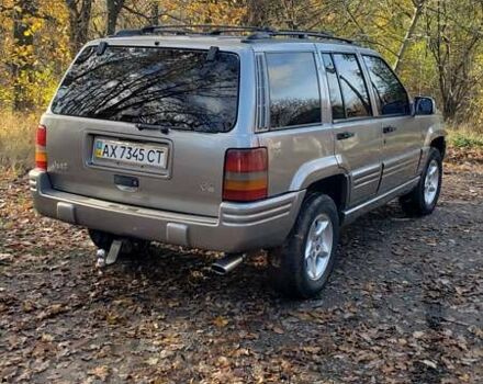 Сірий Джип Grand Cherokee, об'ємом двигуна 5.9 л та пробігом 216 тис. км за 10000 $, фото 2 на Automoto.ua