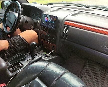 Сірий Джип Grand Cherokee, об'ємом двигуна 4.7 л та пробігом 393 тис. км за 7500 $, фото 4 на Automoto.ua