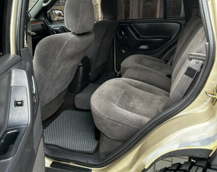Сірий Джип Grand Cherokee, об'ємом двигуна 4 л та пробігом 230 тис. км за 12500 $, фото 13 на Automoto.ua