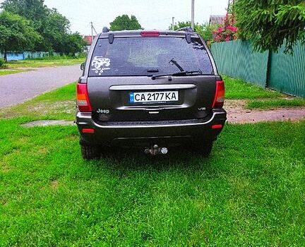 Сірий Джип Grand Cherokee, об'ємом двигуна 4.7 л та пробігом 393 тис. км за 7500 $, фото 3 на Automoto.ua