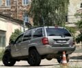Сірий Джип Grand Cherokee, об'ємом двигуна 4.7 л та пробігом 200 тис. км за 7494 $, фото 1 на Automoto.ua