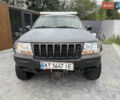 Сірий Джип Grand Cherokee, об'ємом двигуна 4.7 л та пробігом 401 тис. км за 9700 $, фото 1 на Automoto.ua