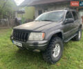 Серый Джип Гранд Чероки, объемом двигателя 4.7 л и пробегом 227 тыс. км за 4000 $, фото 1 на Automoto.ua