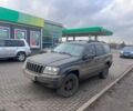 Серый Джип Гранд Чероки, объемом двигателя 4 л и пробегом 385 тыс. км за 3500 $, фото 1 на Automoto.ua
