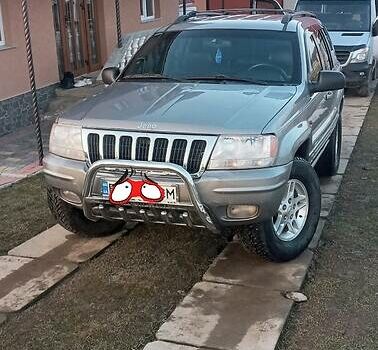 Сірий Джип Grand Cherokee, об'ємом двигуна 3.1 л та пробігом 305 тис. км за 7000 $, фото 3 на Automoto.ua