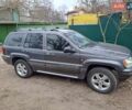 Серый Джип Гранд Чероки, объемом двигателя 3.12 л и пробегом 270 тыс. км за 13000 $, фото 2 на Automoto.ua