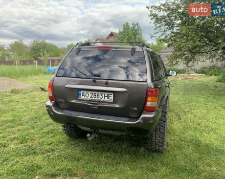 Серый Джип Гранд Чероки, объемом двигателя 4.7 л и пробегом 227 тыс. км за 4000 $, фото 3 на Automoto.ua