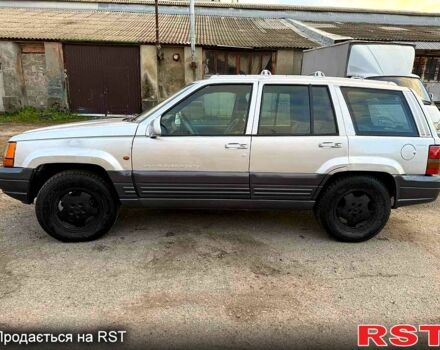 Сірий Джип Grand Cherokee, об'ємом двигуна 3 л та пробігом 280 тис. км за 3000 $, фото 4 на Automoto.ua