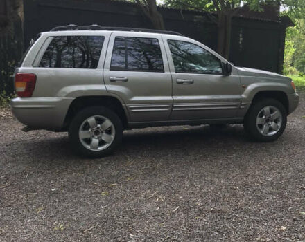 Сірий Джип Grand Cherokee, об'ємом двигуна 3.2 л та пробігом 215 тис. км за 7500 $, фото 2 на Automoto.ua