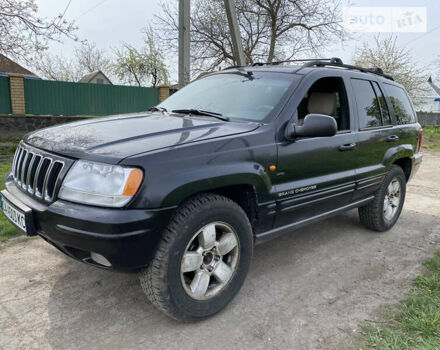 Сірий Джип Grand Cherokee, об'ємом двигуна 3.1 л та пробігом 260 тис. км за 5750 $, фото 2 на Automoto.ua