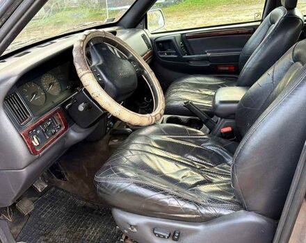 Сірий Джип Grand Cherokee, об'ємом двигуна 3 л та пробігом 280 тис. км за 3000 $, фото 6 на Automoto.ua