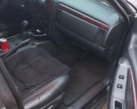 Серый Джип Гранд Чероки, объемом двигателя 2 л и пробегом 298 тыс. км за 5200 $, фото 6 на Automoto.ua