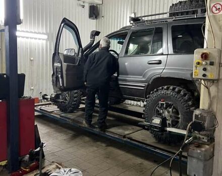 Сірий Джип Grand Cherokee, об'ємом двигуна 4.7 л та пробігом 100 тис. км за 12000 $, фото 5 на Automoto.ua