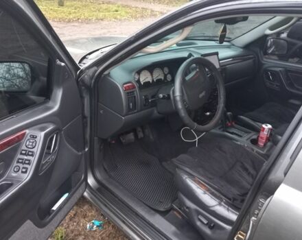 Серый Джип Гранд Чероки, объемом двигателя 2 л и пробегом 298 тыс. км за 5200 $, фото 4 на Automoto.ua