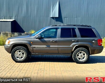 Серый Джип Гранд Чероки, объемом двигателя 3.1 л и пробегом 243 тыс. км за 4321 $, фото 1 на Automoto.ua