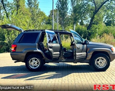 Серый Джип Гранд Чероки, объемом двигателя 3.1 л и пробегом 243 тыс. км за 4321 $, фото 4 на Automoto.ua