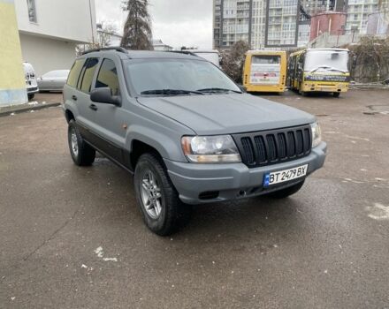 Серый Джип Гранд Чероки, объемом двигателя 2.7 л и пробегом 300 тыс. км за 11000 $, фото 1 на Automoto.ua