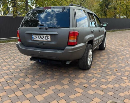 Джип Гранд Чероки 2002 в Сторожинце на Automoto.ua Серый Джип Гранд Чероки, объемом двигателя 2.69 л и пробегом 248 тыс. км за 8990 $, фото 2 на Automoto.ua