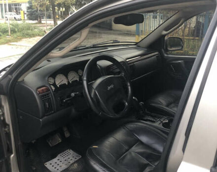 Серый Джип Гранд Чероки, объемом двигателя 2.69 л и пробегом 441 тыс. км за 9100 $, фото 6 на Automoto.ua