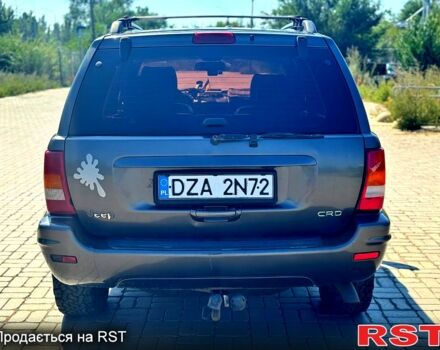 Серый Джип Гранд Чероки, объемом двигателя 3.1 л и пробегом 243 тыс. км за 4321 $, фото 2 на Automoto.ua