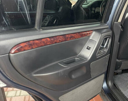 Серый Джип Гранд Чероки, объемом двигателя 2.7 л и пробегом 231 тыс. км за 9500 $, фото 2 на Automoto.ua