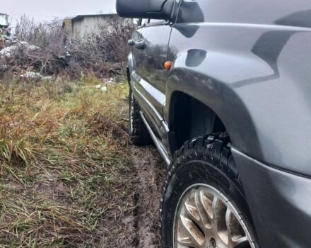 Серый Джип Гранд Чероки, объемом двигателя 2 л и пробегом 298 тыс. км за 5200 $, фото 1 на Automoto.ua