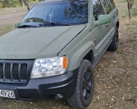 Джип Гранд Чероки 2003 в Новониколаевке на Automoto.ua Серый Джип Гранд Чероки, объемом двигателя 2.7 л и пробегом 348 тыс. км за 5200 $, фото 2 на Automoto.ua