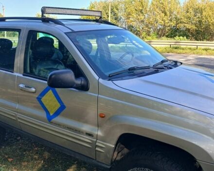 Серый Джип Гранд Чероки, объемом двигателя 2.7 л и пробегом 241 тыс. км за 8500 $, фото 2 на Automoto.ua